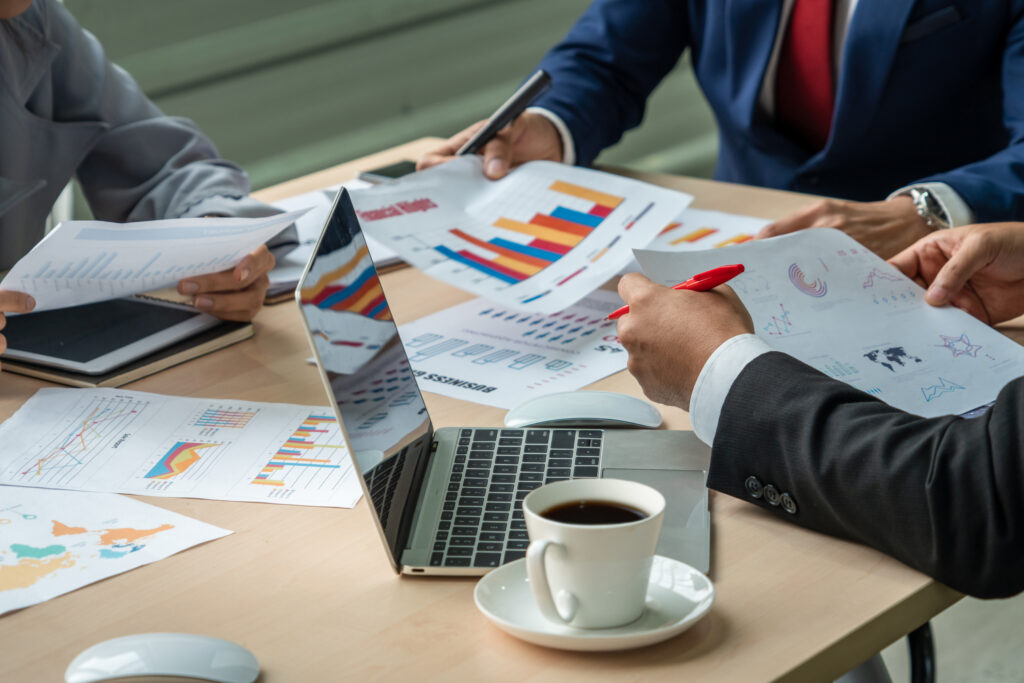 notebook and coffee on the table • Managed IT Services and Cybersecurity Provider in Singapore. notebook and coffee on the table