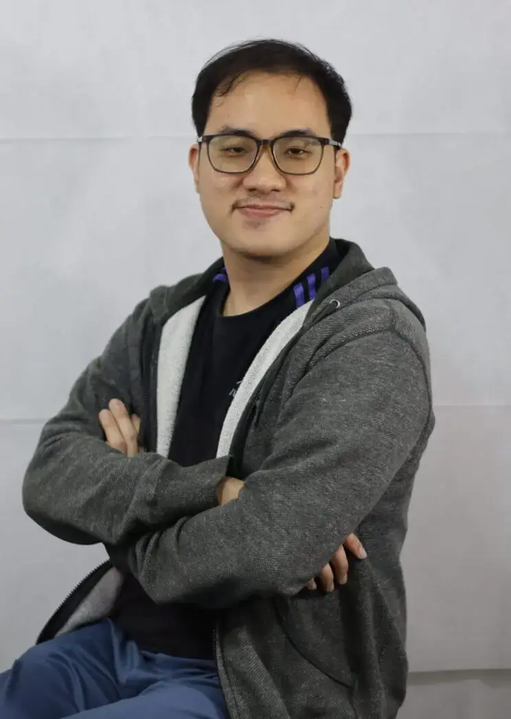 Reuben • Managed IT Services and Cybersecurity Provider in Singapore. R.Yap arm crossed