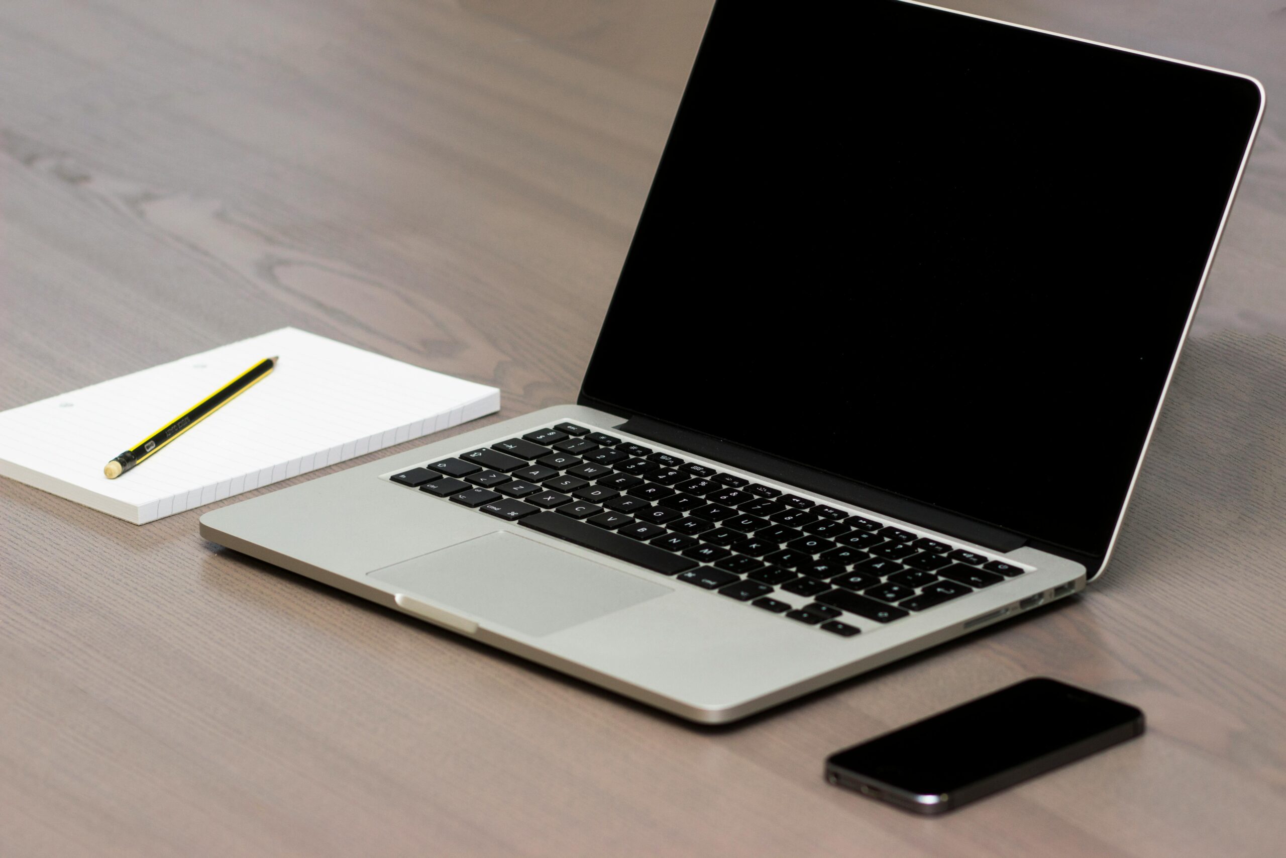 pexels-morningtrain-18104-scaledjpg • Managed IT Services and Cybersecurity Provider in Singapore. Free Silver Macbook Beside Iphone Stock Photo