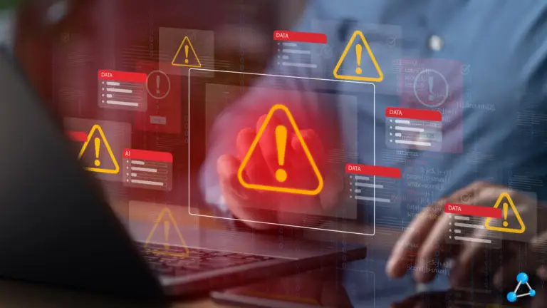 Bright orange warning triangle icons on a laptop screen, signaling data security alerts and system warnings.